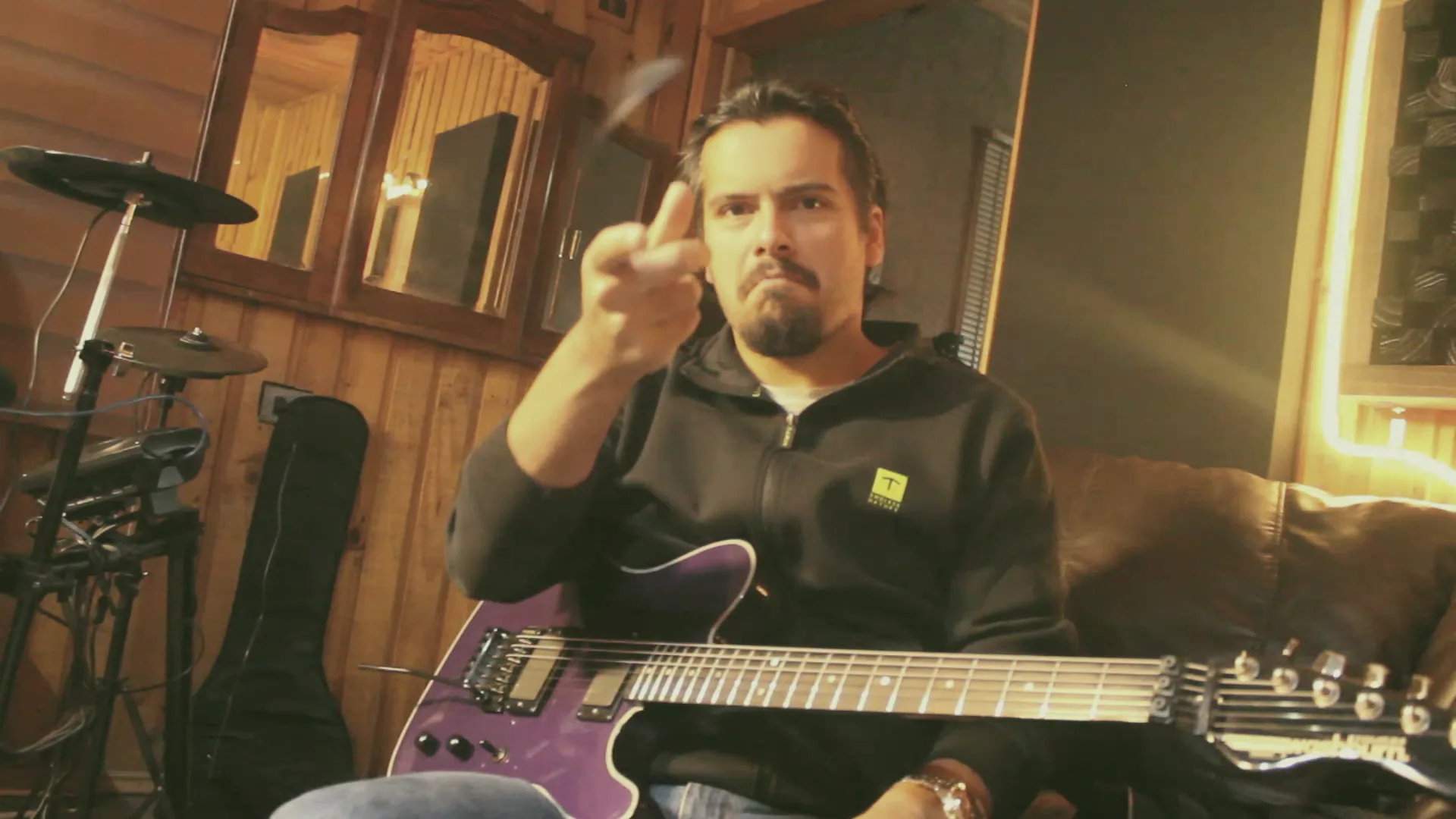 Pablo playing guitar in the studio